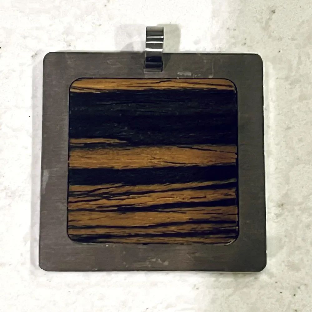 *3/$20* Tivi Colorado stainless steel and zebrawood inlay pendant